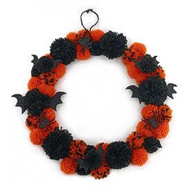 Ball of black orange wool wreath